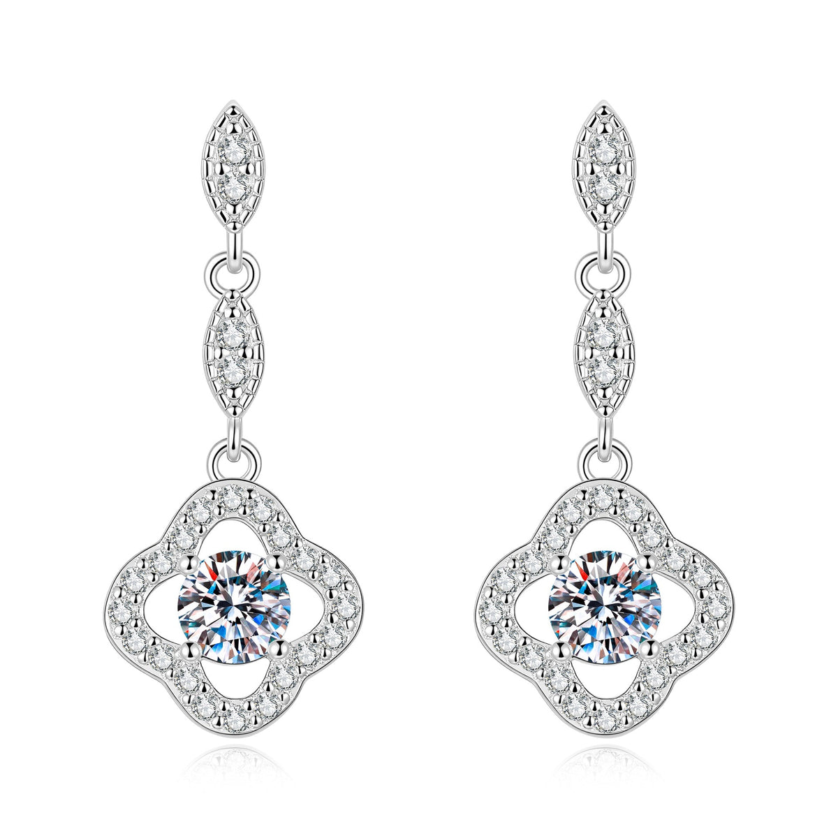 Sterling silver four-leaf clover tassel earrings with moissanite on a white background