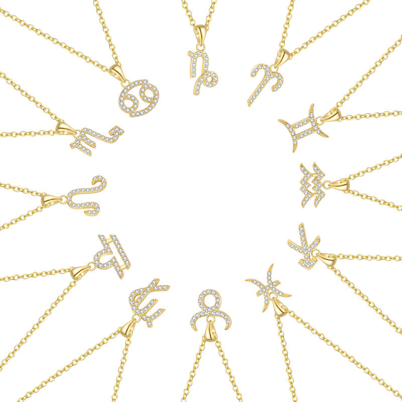 Gold-plated silver zodiac pendant necklaces on a white background