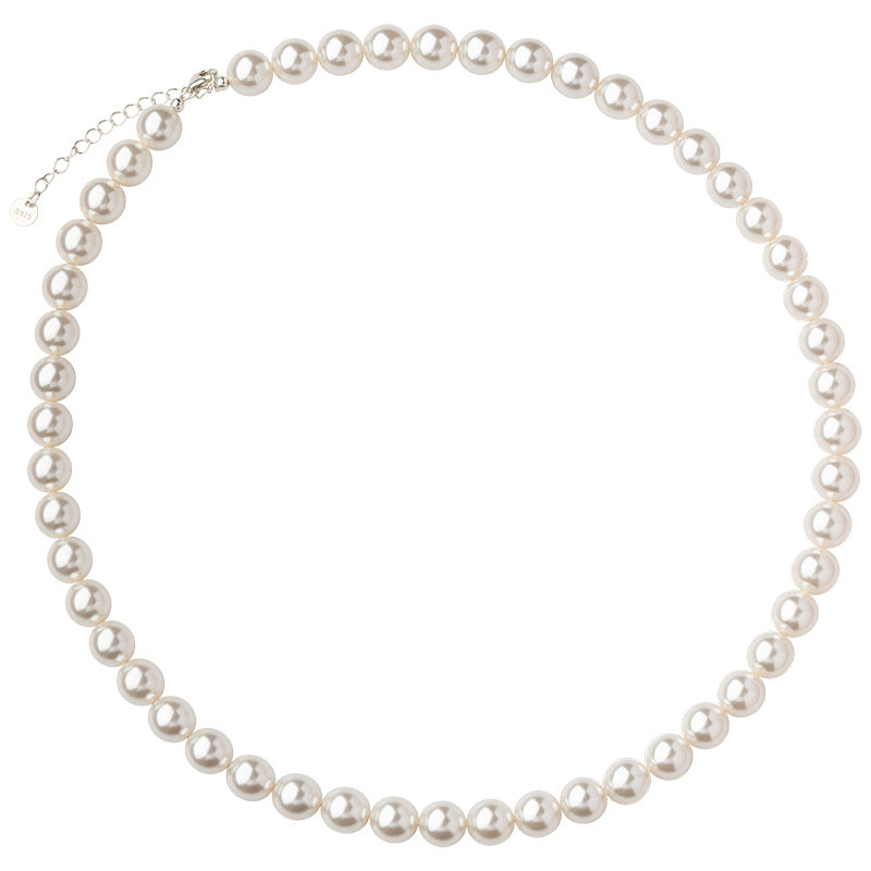 Silver freshwater pearl strand necklace on a white background
