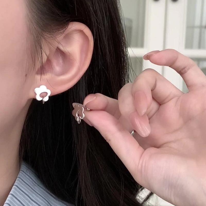 999 silver flower shaped earrings - silvery