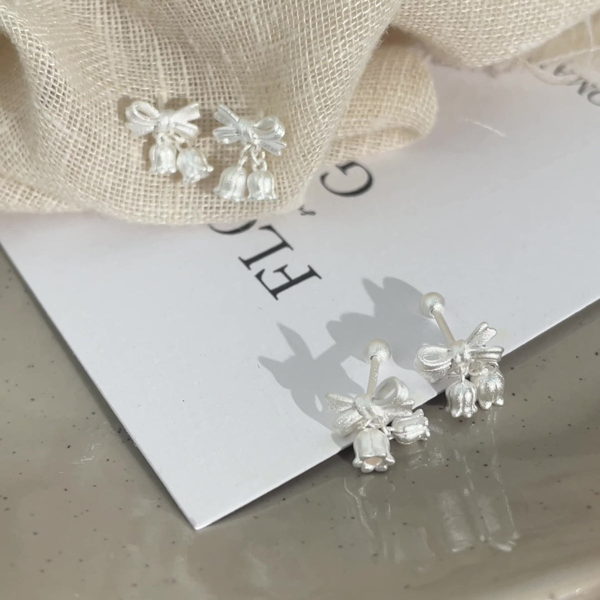 S925 pure silver bell orchid bow earrings
