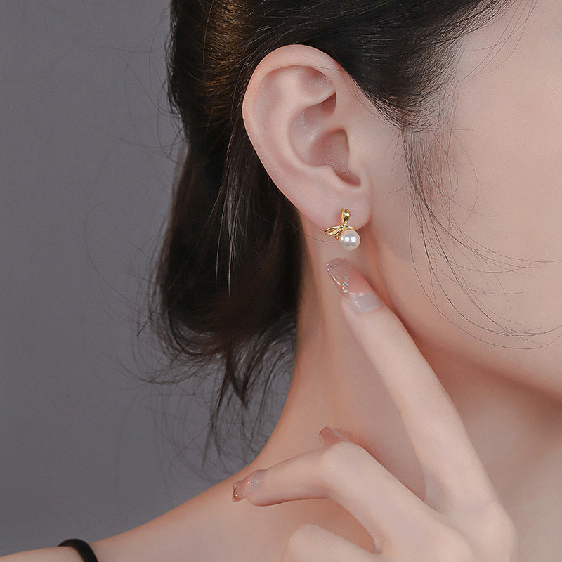 925 sterling silver bowknot pearl earrings