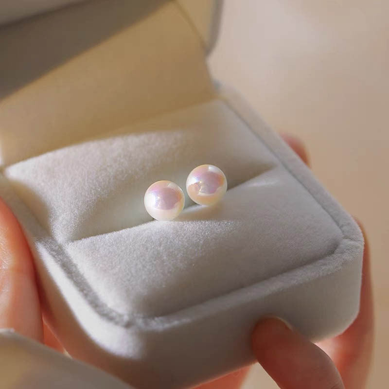 999 silver colored imitation pearl earrings