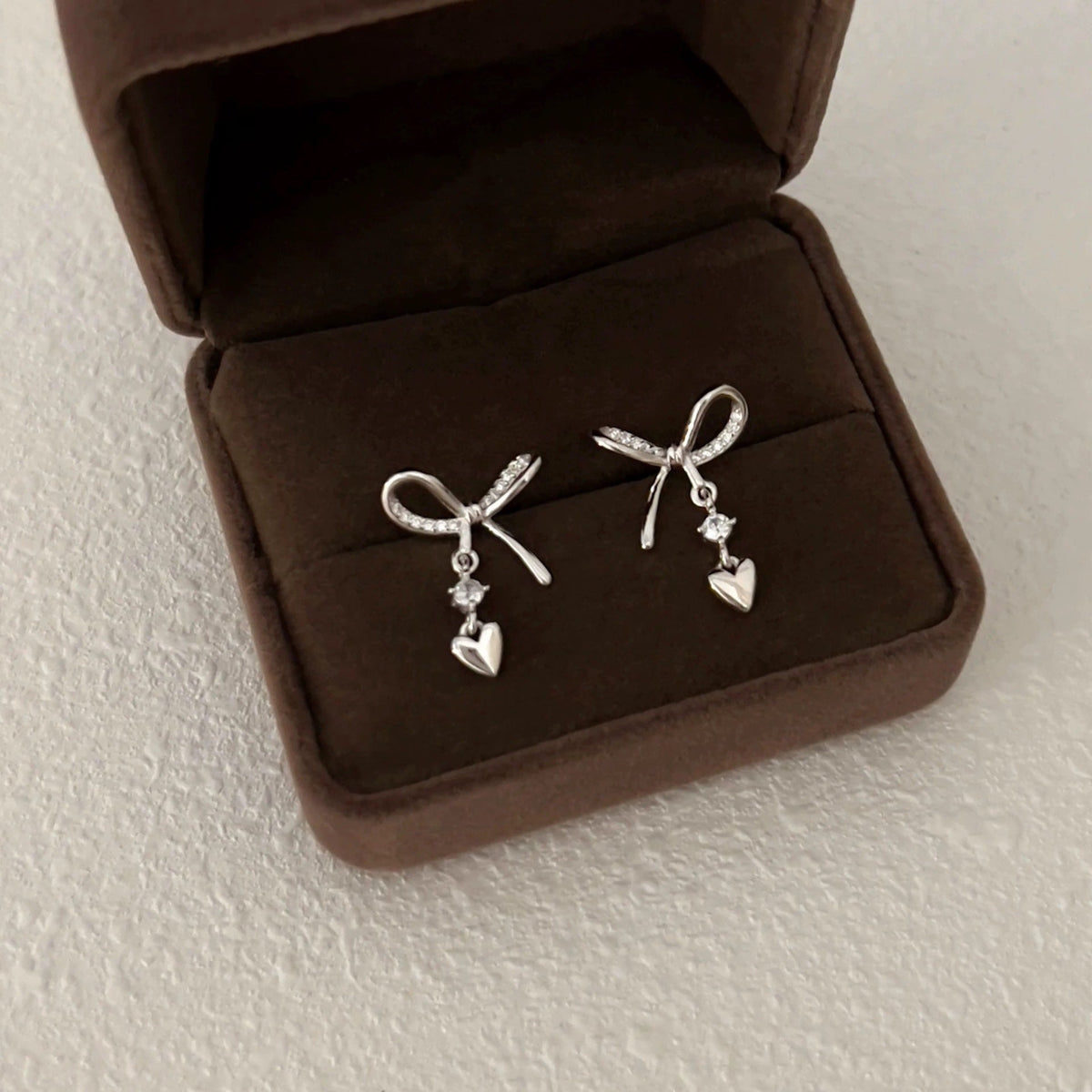 S925 sterling silver bow heart tassel earrings