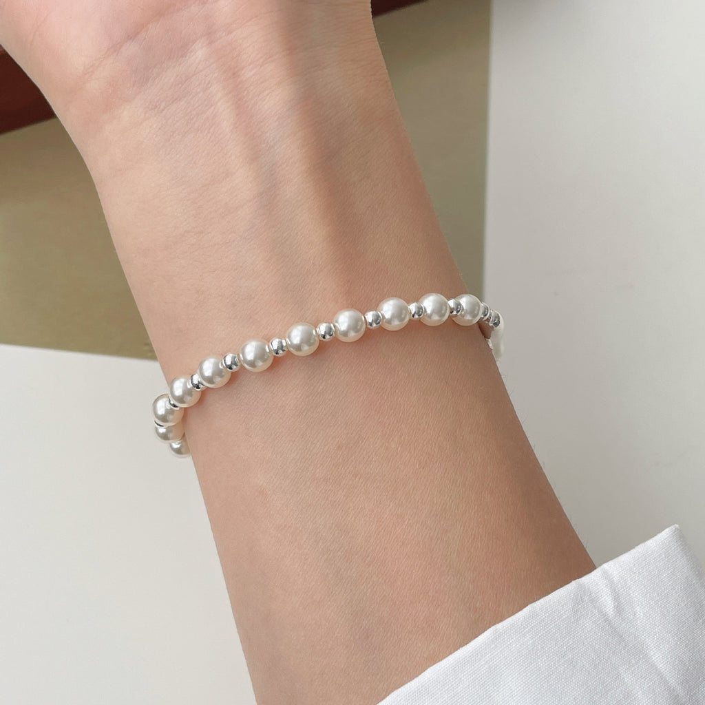 925 sterling silver asymmetrical pearl bracelet - silvery