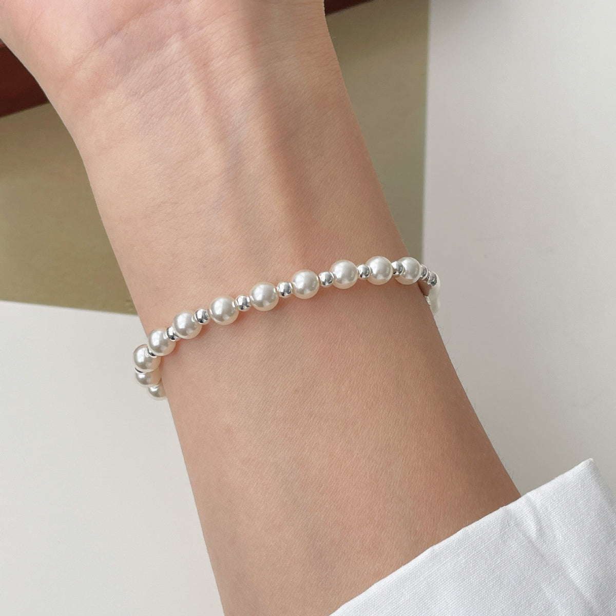 925 sterling silver asymmetrical pearl bracelet - silvery