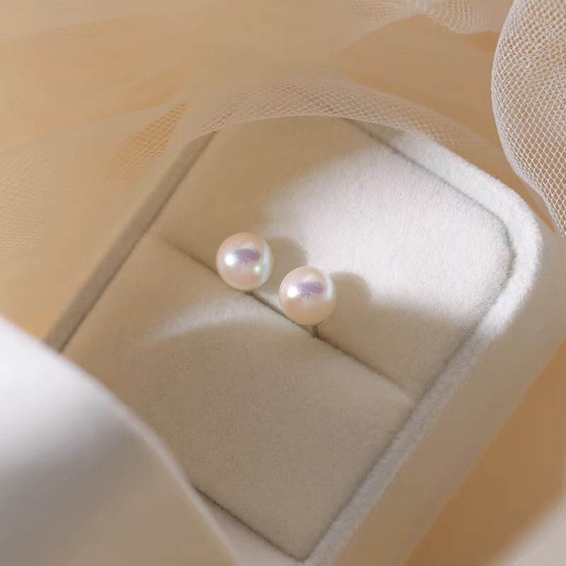 999 silver colored imitation pearl earrings