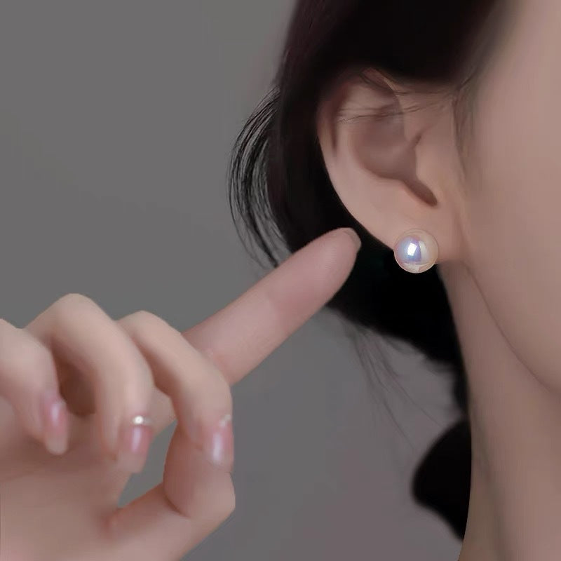 999 silver colored imitation pearl earrings
