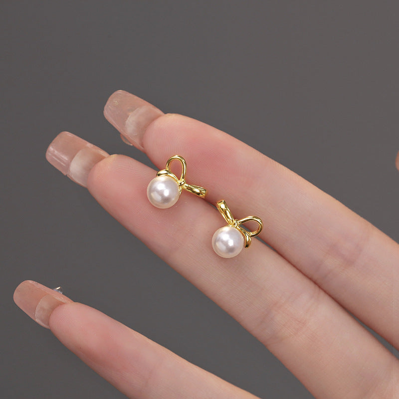 925 sterling silver bowknot pearl earrings