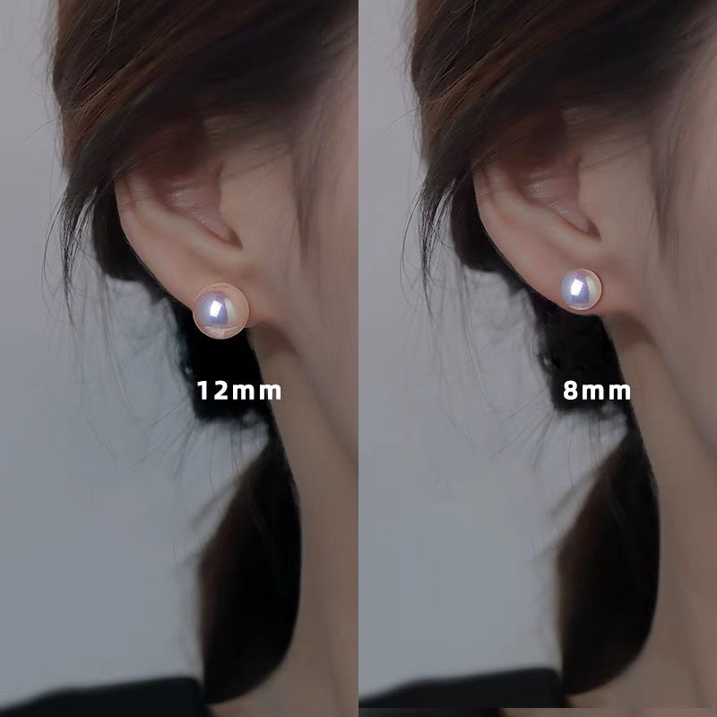 999 silver colored imitation pearl earrings