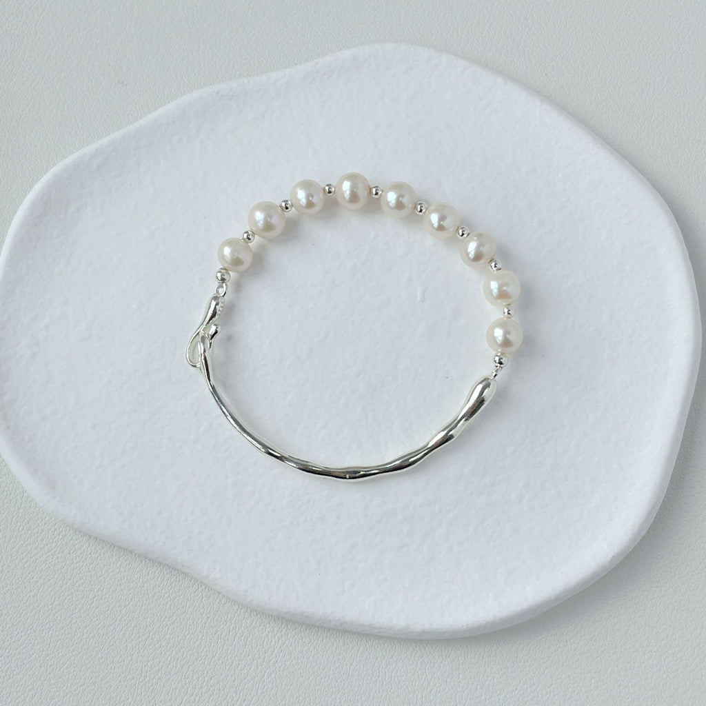 925 sterling silver asymmetrical pearl bracelet - silvery