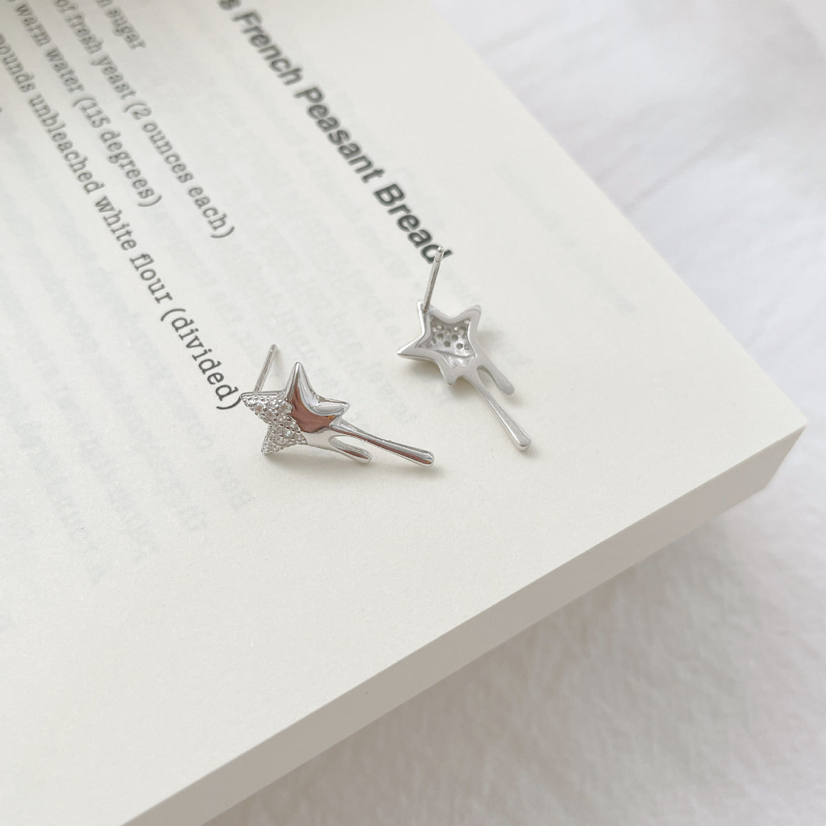 925 sterling silver star shaped earrings - silvery