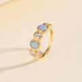 Cabochon Opal and Zircon Ring