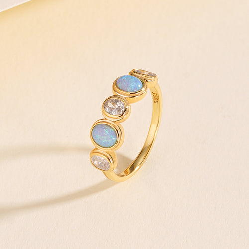 Cabochon Opal and Zircon Ring