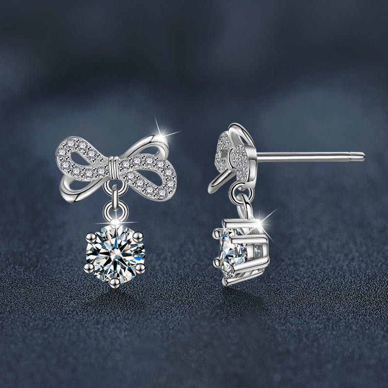 Stylish and elegant moissanite earrings with a bow design in 925 sterling silver