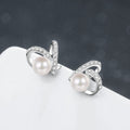 Elegant Pearl and Moissanite Heart Stud Earrings