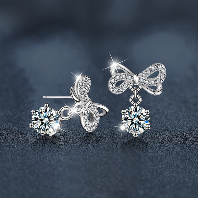 Stylish and elegant moissanite earrings with a bow design in 925 sterling silver
