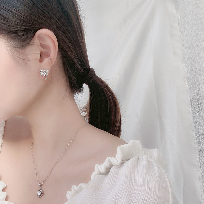 Exquisite 925 sterling silver moissanite bow earrings