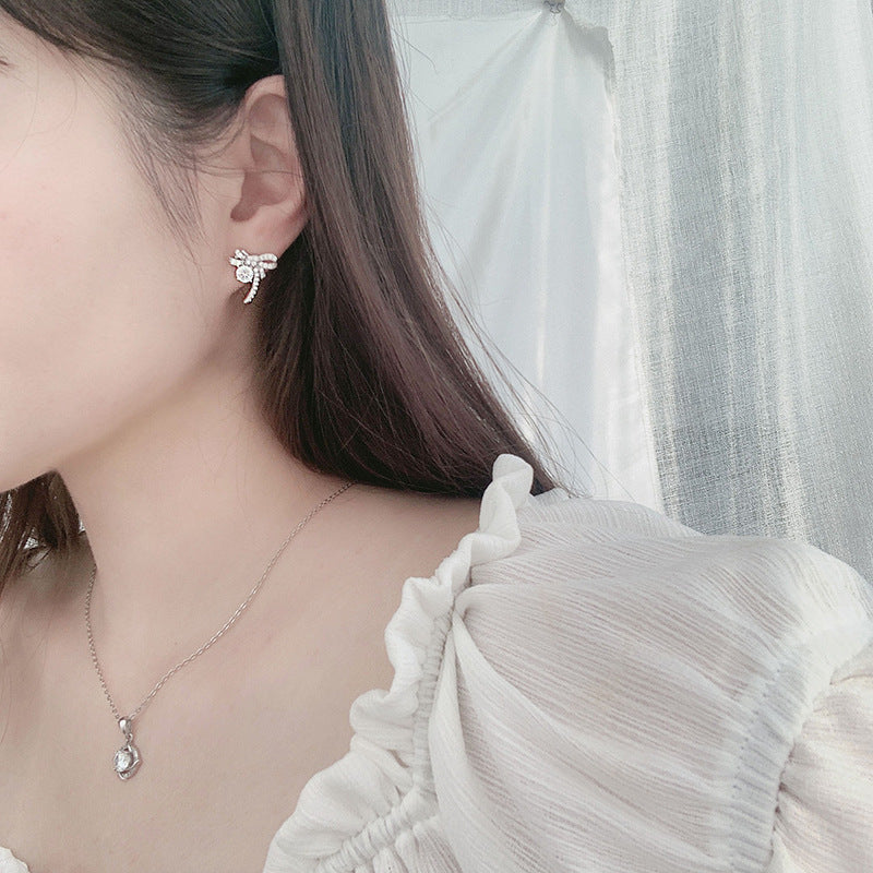 Exquisite 925 sterling silver moissanite bow earrings