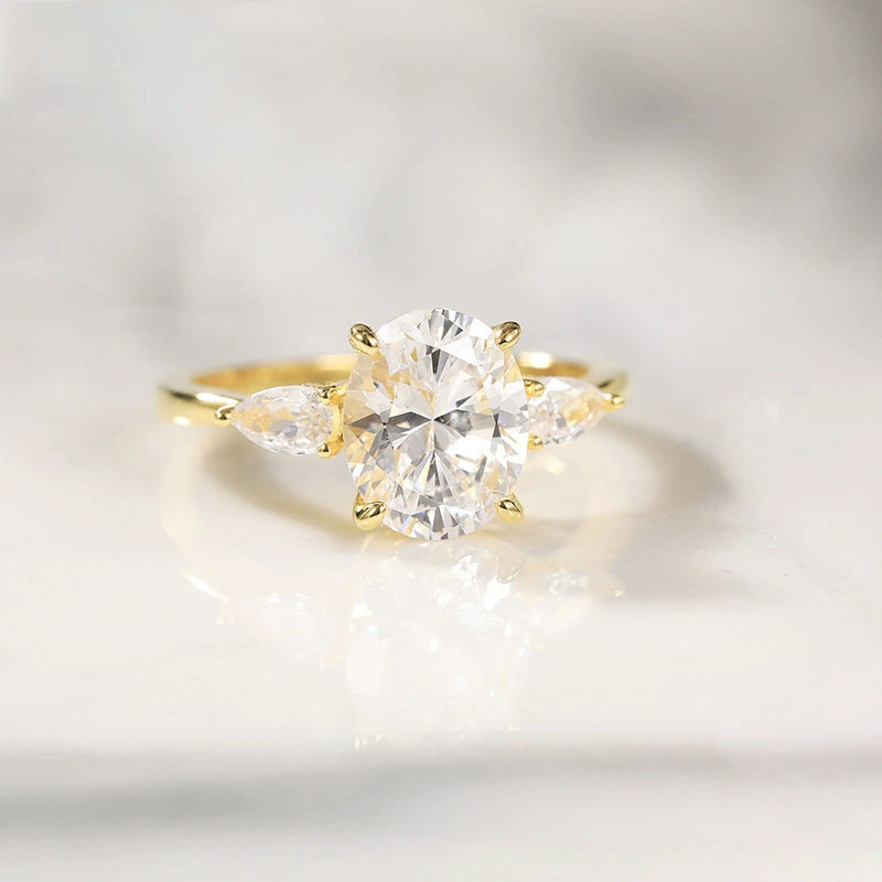 Oval CZ Three-Stone Ring With Pear Accents – detail view 3