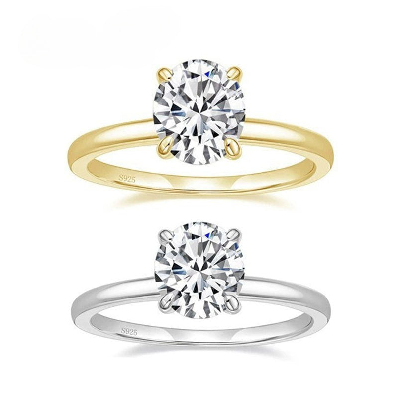 Round Cut CZ Four-Prong Solitaire Ring
